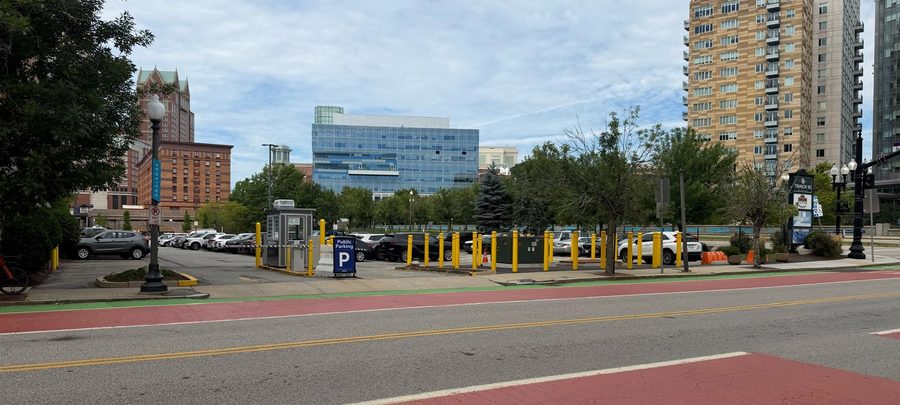 Union Station surface parking lot with downtown Providence behind it